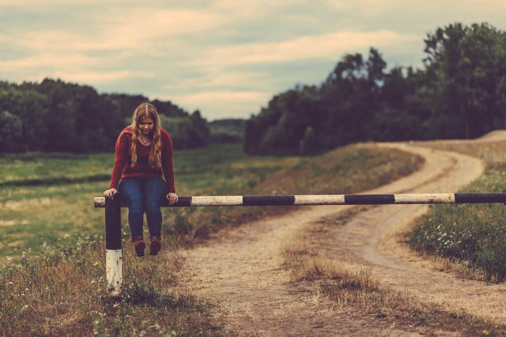 girl, sitting, barrier, female, woman, people, young, attractive, thinking, nature, road, path, brown road, brown thinking, brown think, brown path, barrier, barrier, barrier, barrier, barrier, thinking